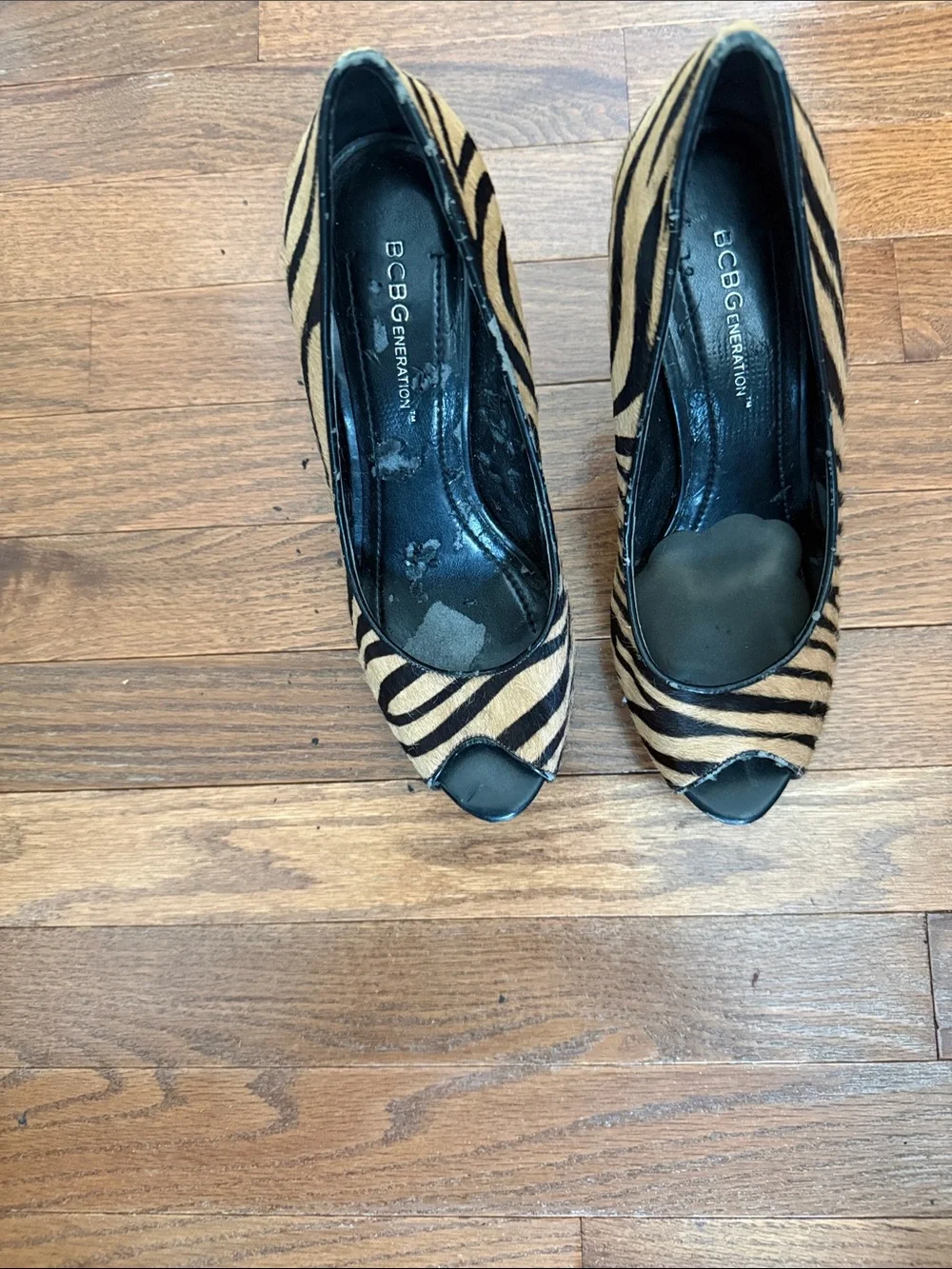 BCBGeneration Zebra-Print Peep-Toe Heels in Tan and Black